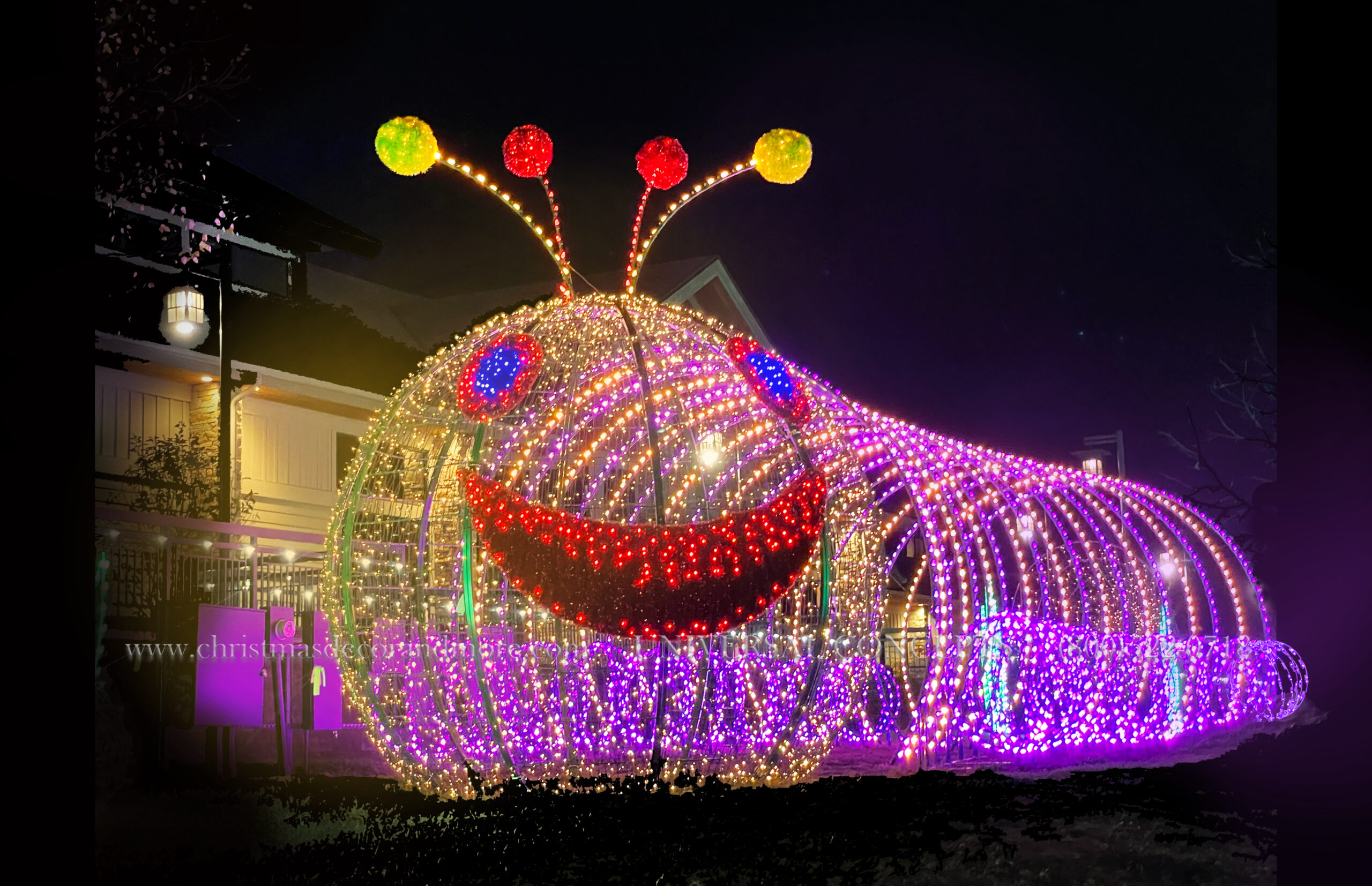 a lighted giant walk-thru caterpillar feature